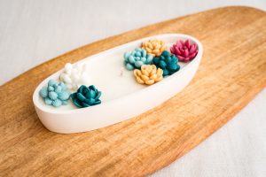 Vela aromática y decorativa ovalada